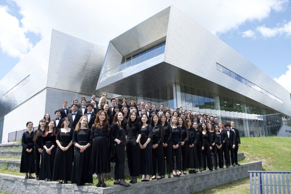 2022 orchestra in front of the isabel bader centre for the perfoming arts